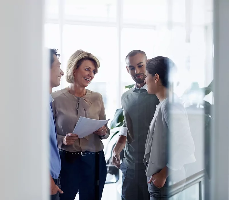 businesswoman discussing with colleagues